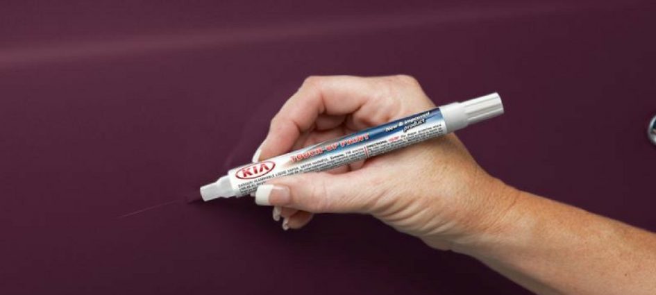 A touch-up paint pen fixing a scratch in a blog about Kia parts