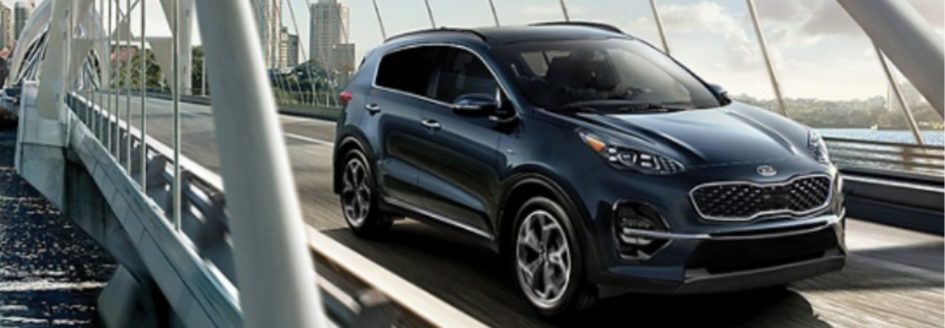 2020 kia sportage driving over a bridge